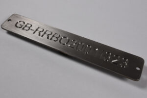Ship registration engraved into stainless steel plate